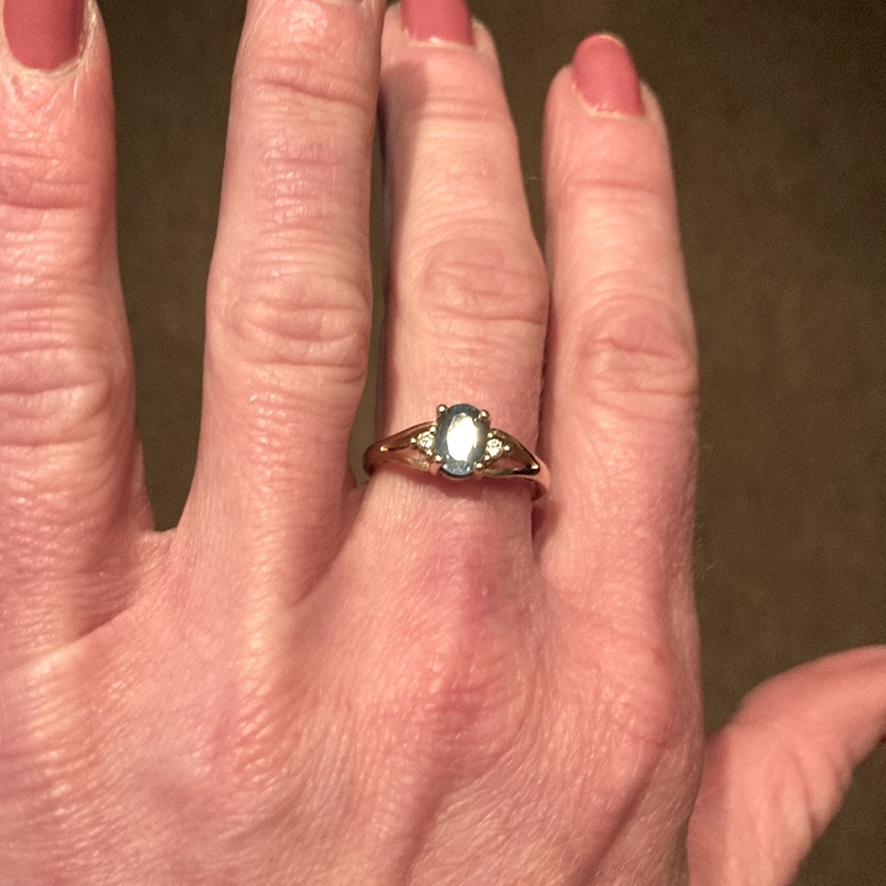 Blue topaz ring set in 14k yellow gold
